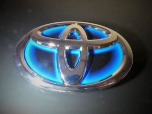 Original Toyota Kühlergrill Abzeichen Vorne Blau Emblem für Auris Hybrid 